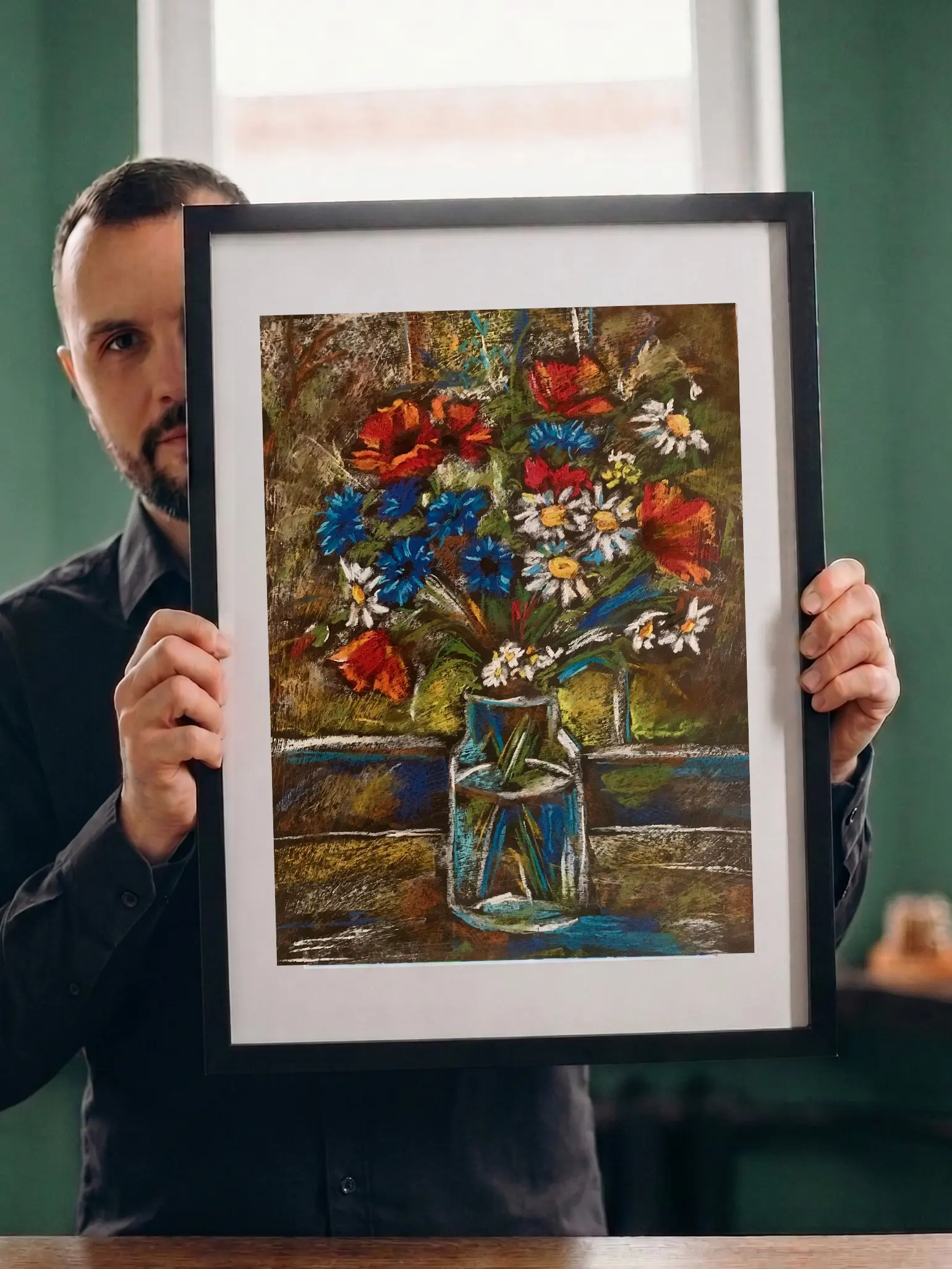 Artist holding framed soft pastel wildflowers still life painting