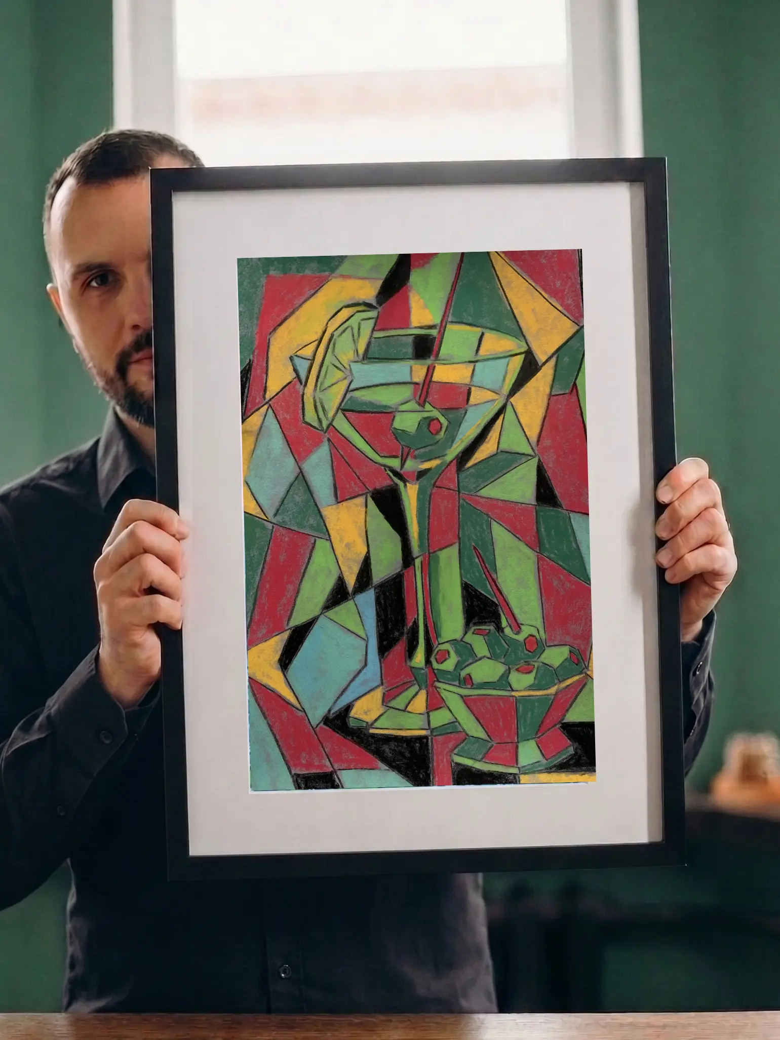 Artist holding framed cubist soft pastel martini painting