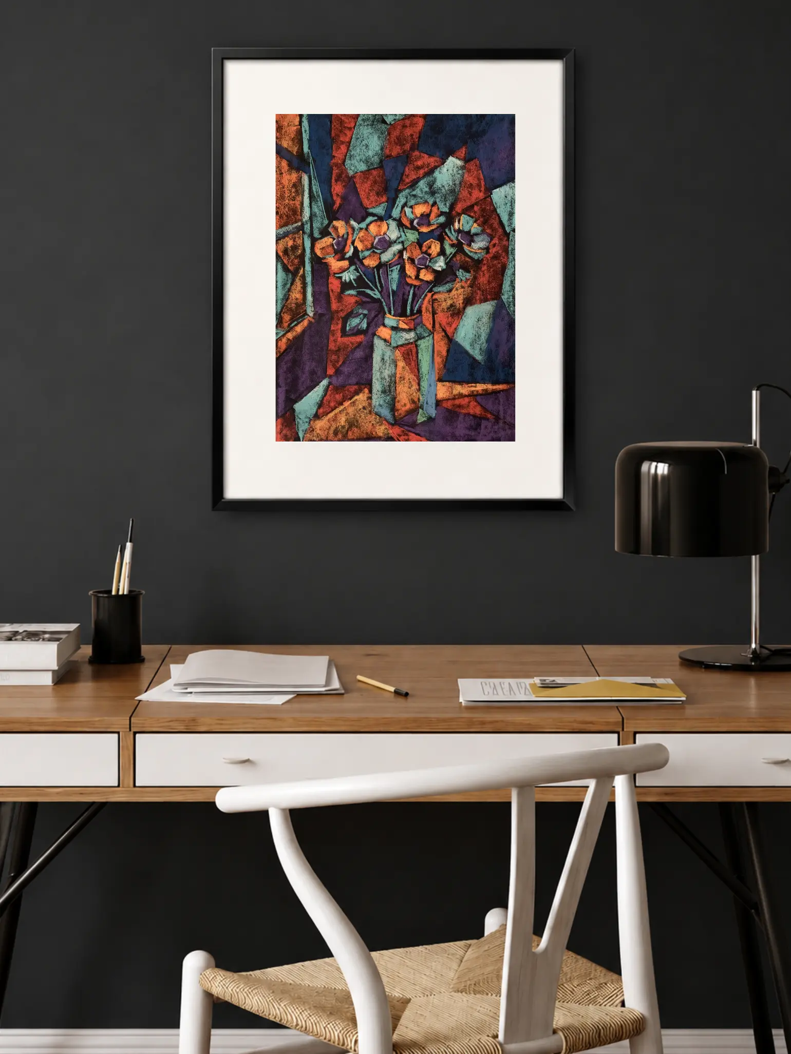 Framed soft pastel flower still life in modern dark home office