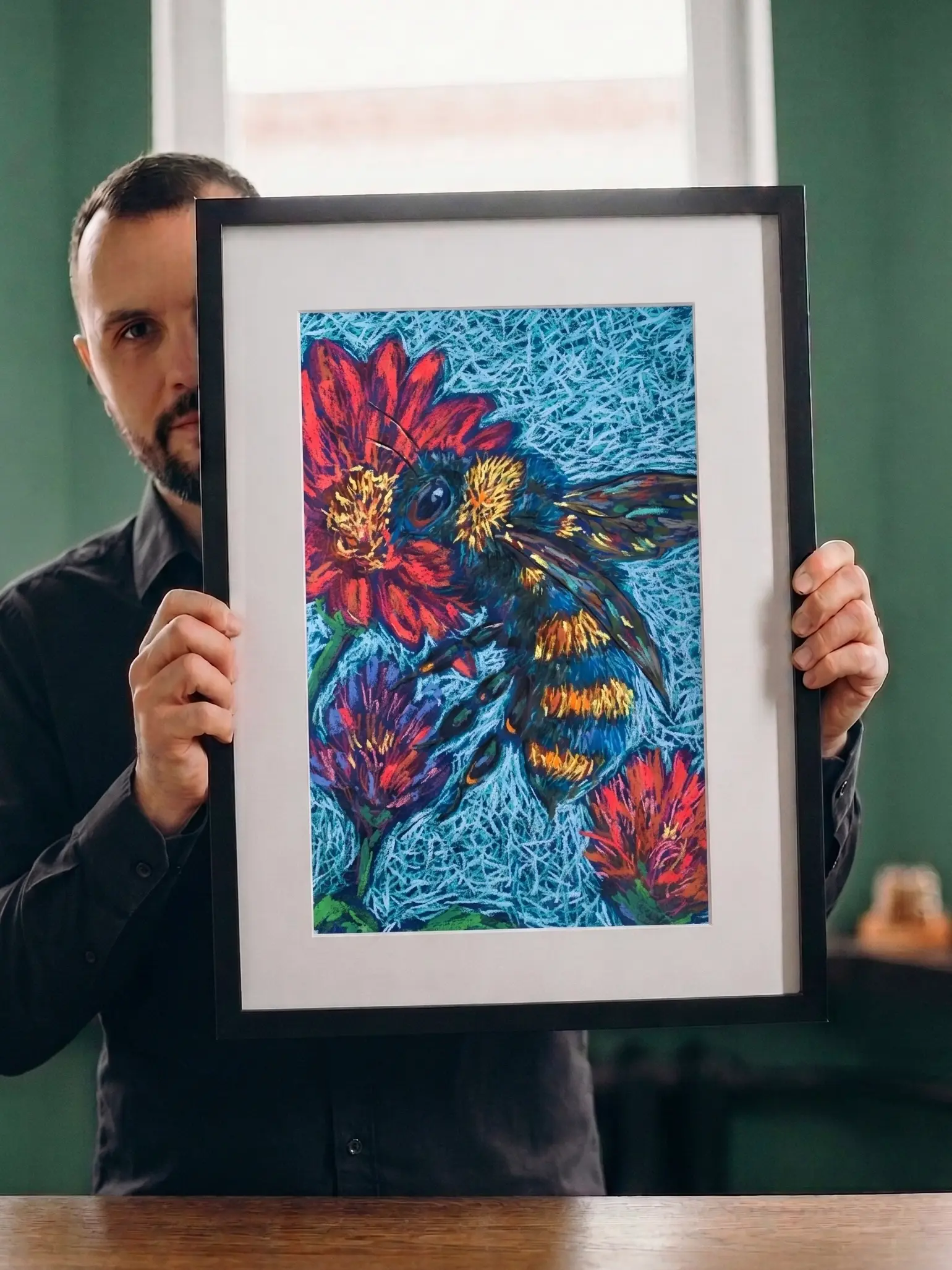 A vibrant expressionist bumblebee painting in soft pastel, showing a furry yellow and blue bee on a bold red flower.