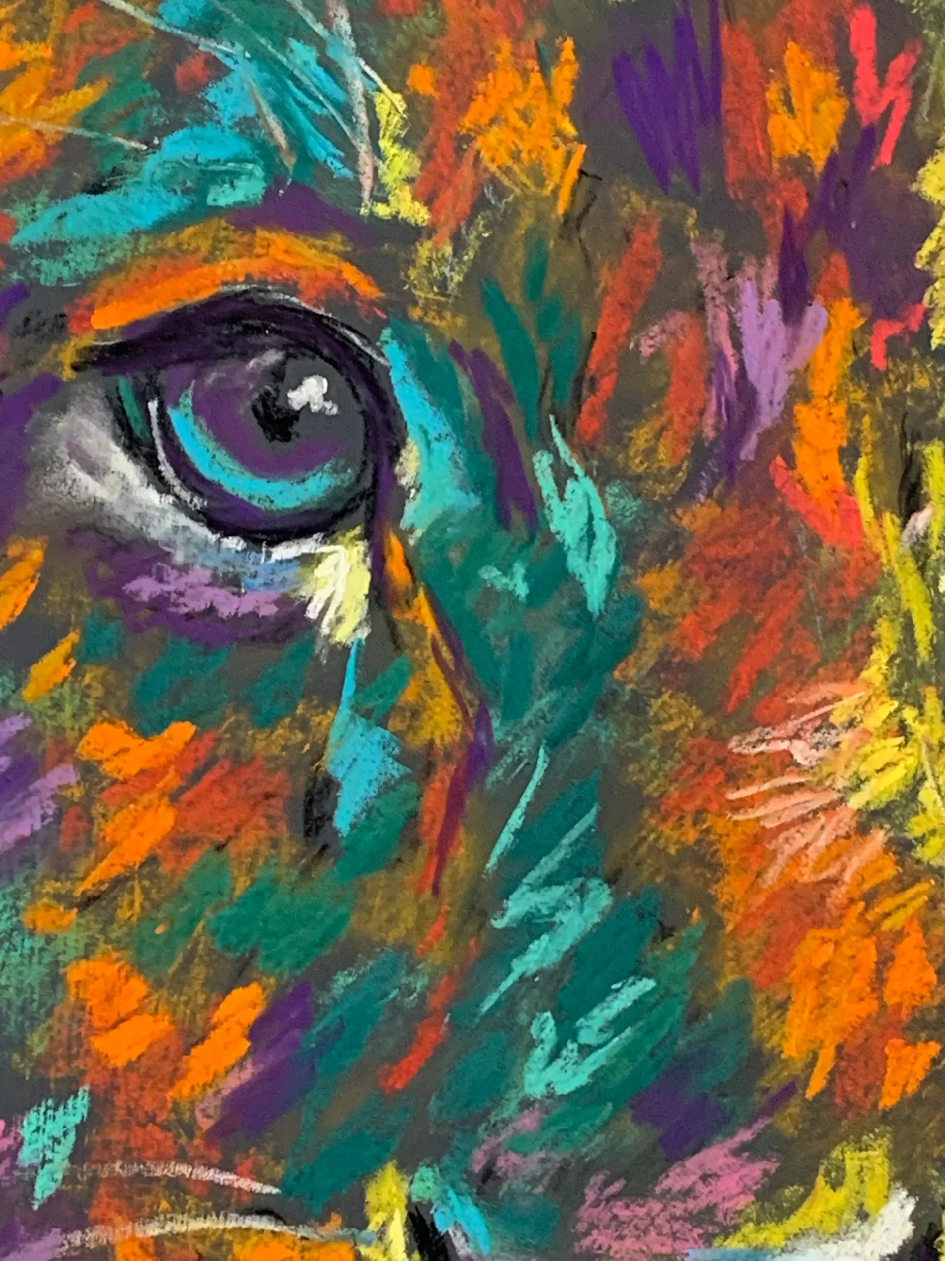 An original expressionist lion cub portrait painting in soft pastel, showcasing a colorful multicolored cub with striking turquoise eyes.