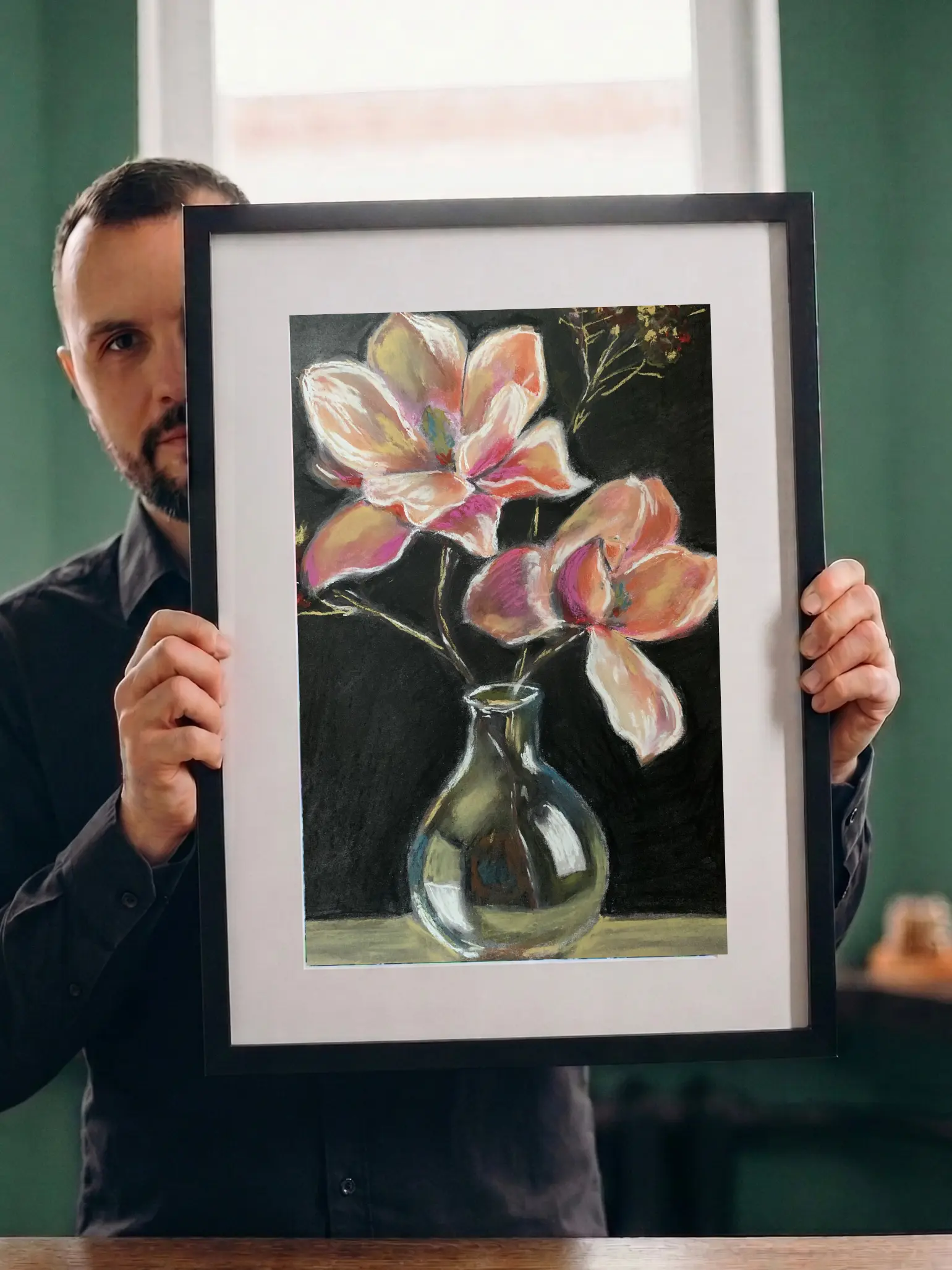 An original expressionist painting in soft pastel of large pink and peach flowers in a reflective glass vase against a dramatic black background.