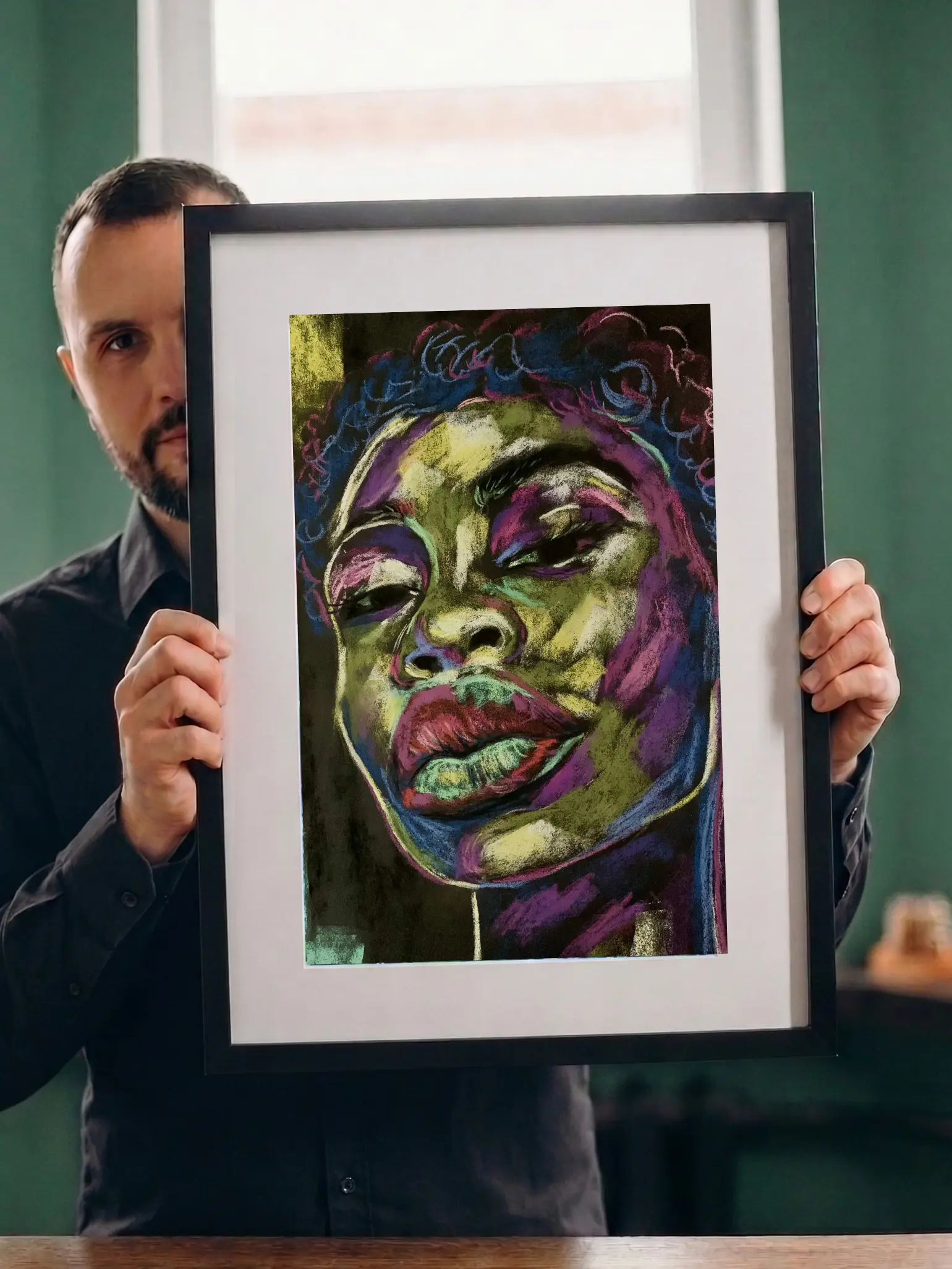 Artist holding framed expressionist soft pastel portrait painting