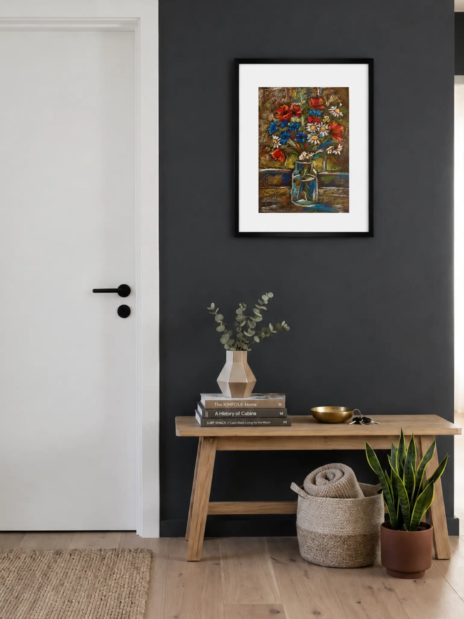 Framed soft pastel wildflowers still life painting in entryway interior