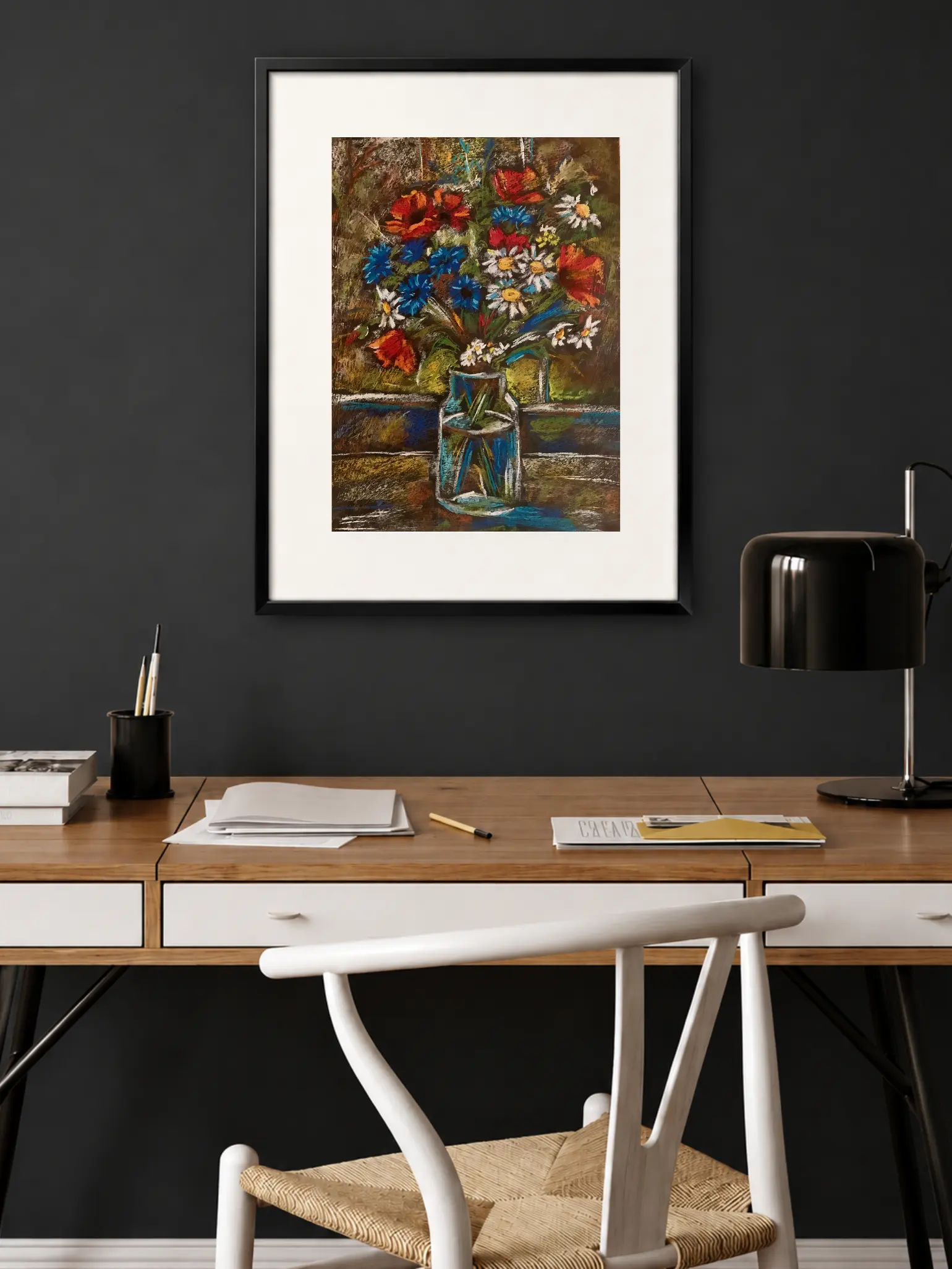 Framed soft pastel wildflowers still life painting in modern home office
