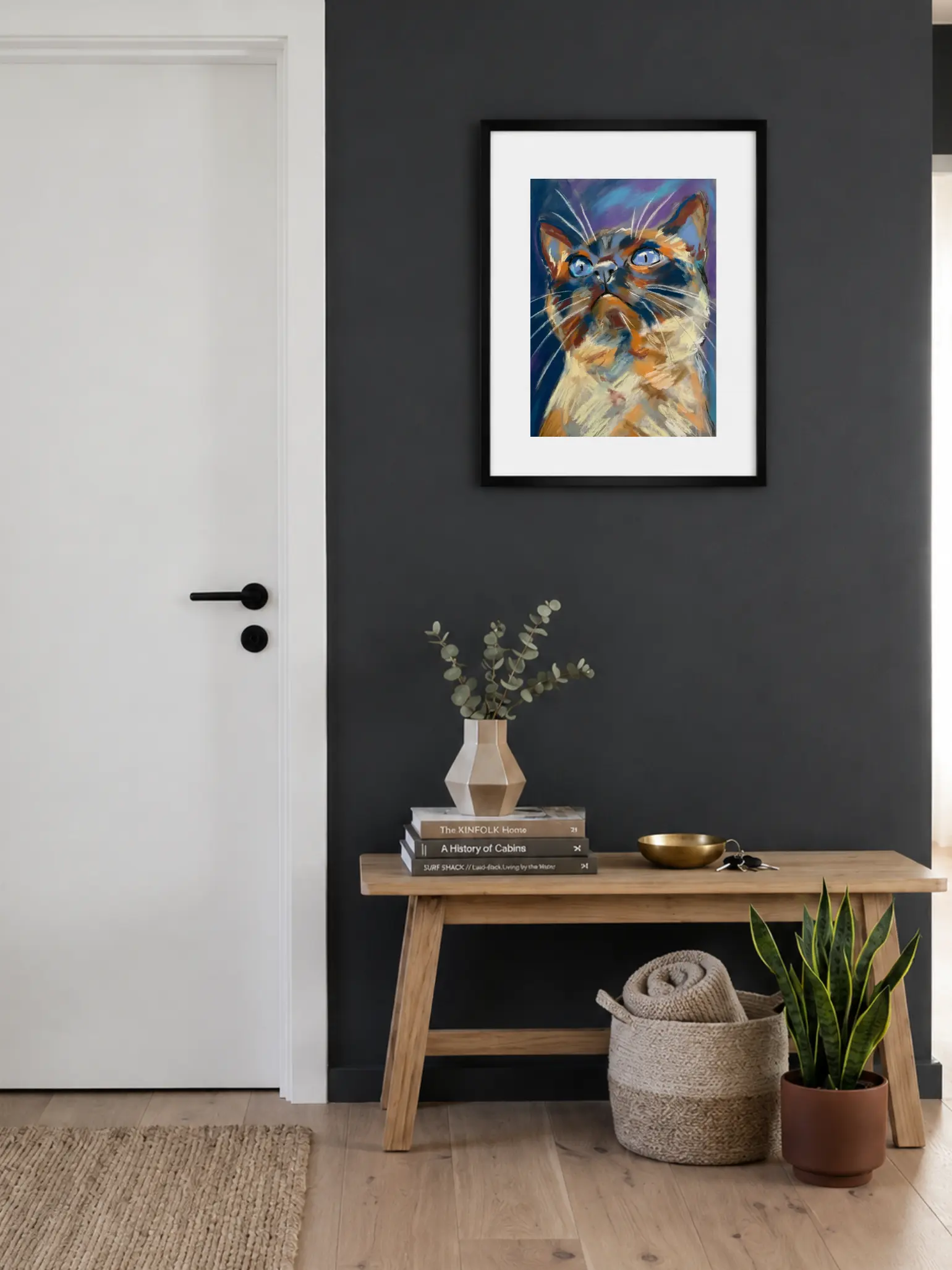 Framed expressionist soft pastel blue-eyed cat painting in entryway interior