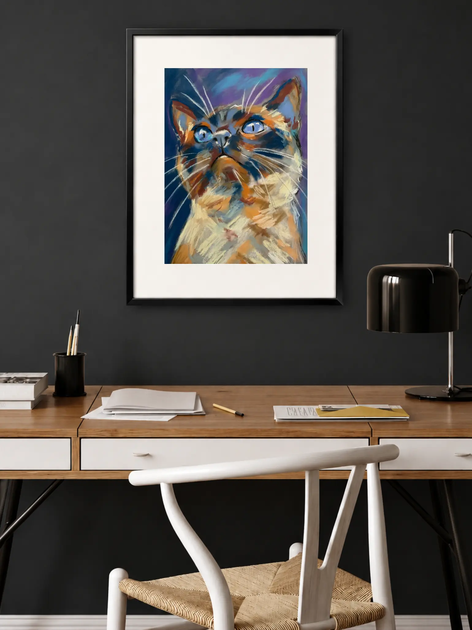 Framed expressionist soft pastel blue-eyed cat painting in modern home office
