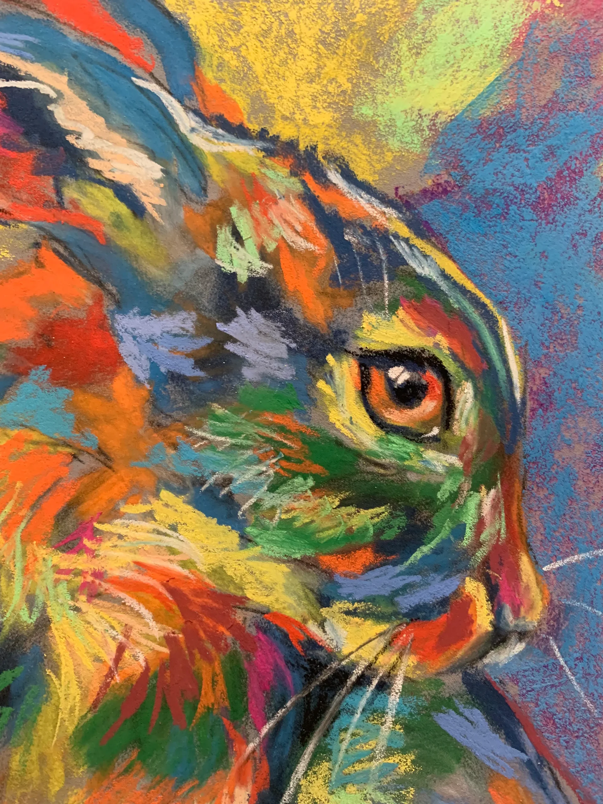 Close-up detail of expressionist soft pastel rainbow hare eye and fur strokes