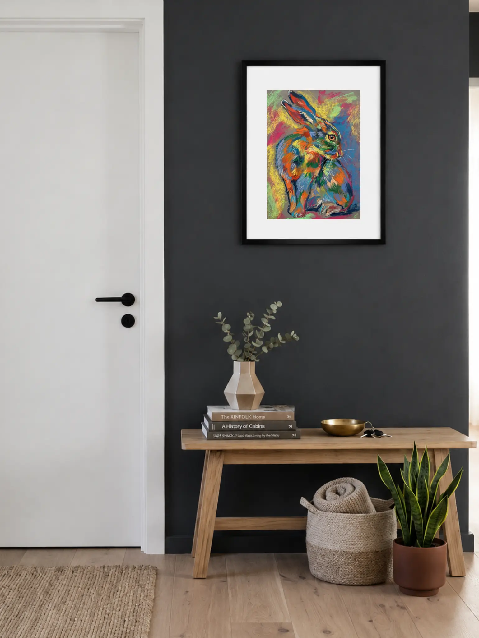 Framed expressionist soft pastel rainbow hare painting in entryway interior