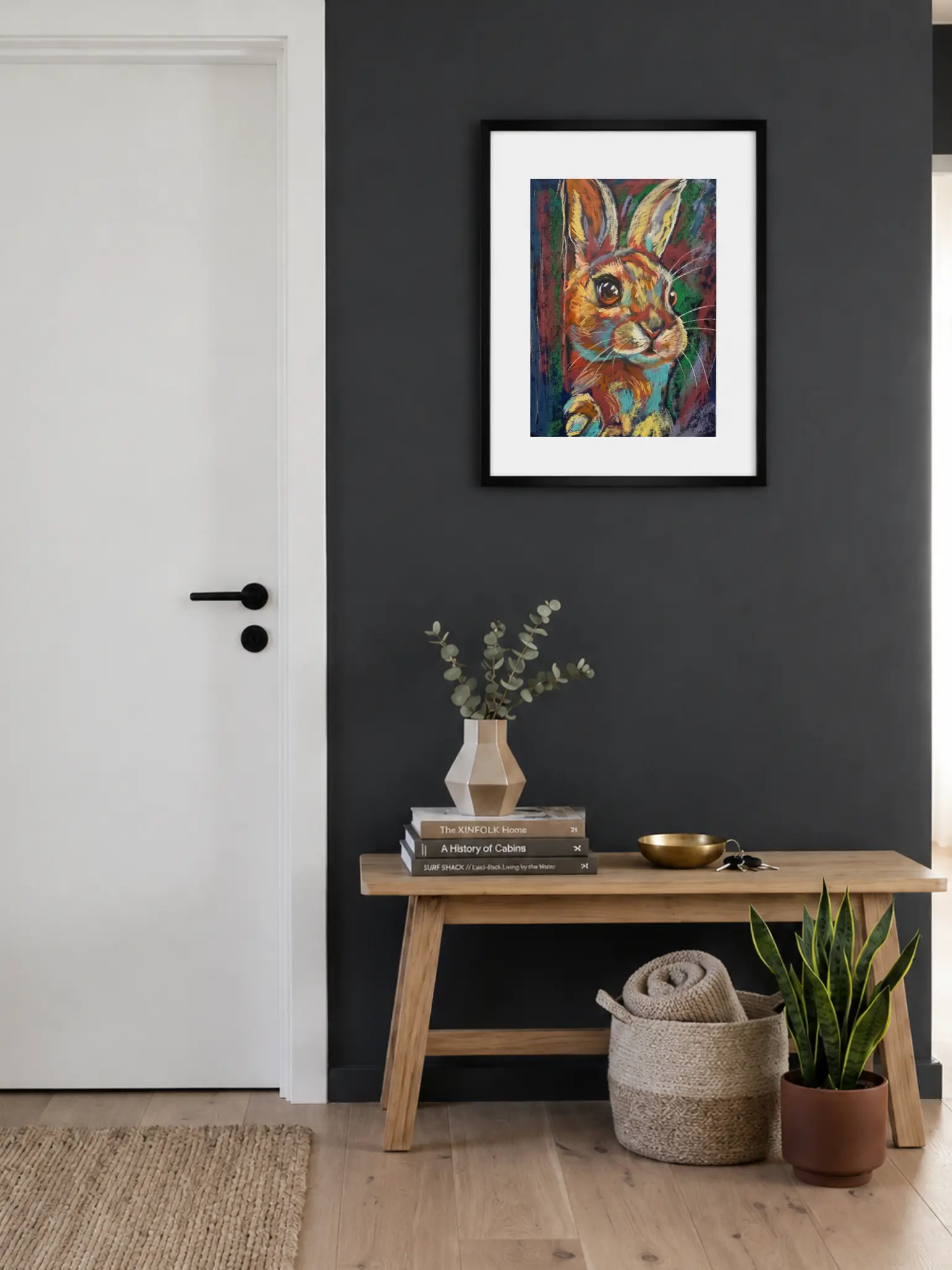 Framed expressionist soft pastel peeking rabbit painting in entryway interior